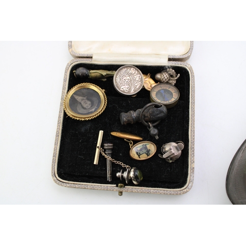 313 - An interesting collection of antique curios to include  miniature compass, silver acorn clip on earr... 