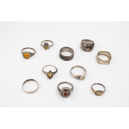 321 - A collection of ten silver rings to include antique gold on silver example, rings set with semi-prec... 