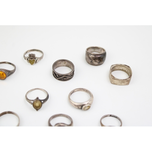 321 - A collection of ten silver rings to include antique gold on silver example, rings set with semi-prec... 