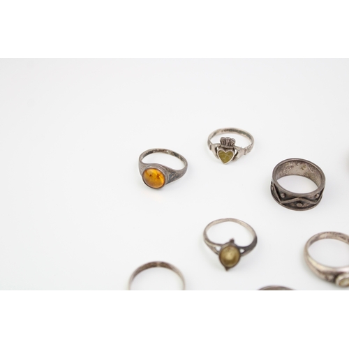 321 - A collection of ten silver rings to include antique gold on silver example, rings set with semi-prec... 