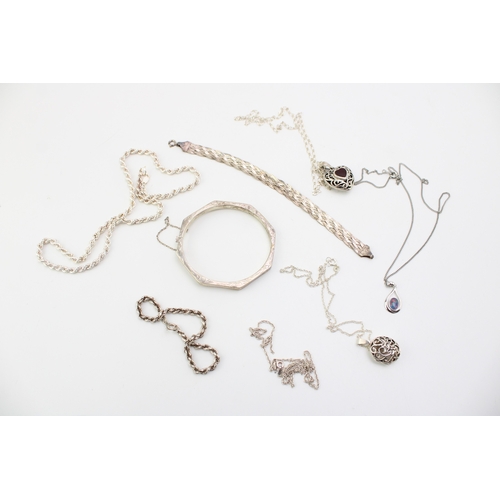 324 - A mixed collection of silver jewellery items to include necklaces, bangles, pendants, bracelets and ... 