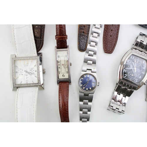 33 - A large group of seventeen vintage and later wristwatches, including a Rotary exhibition cased autom... 