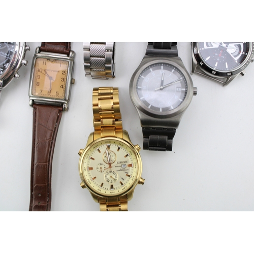 33 - A large group of seventeen vintage and later wristwatches, including a Rotary exhibition cased autom... 