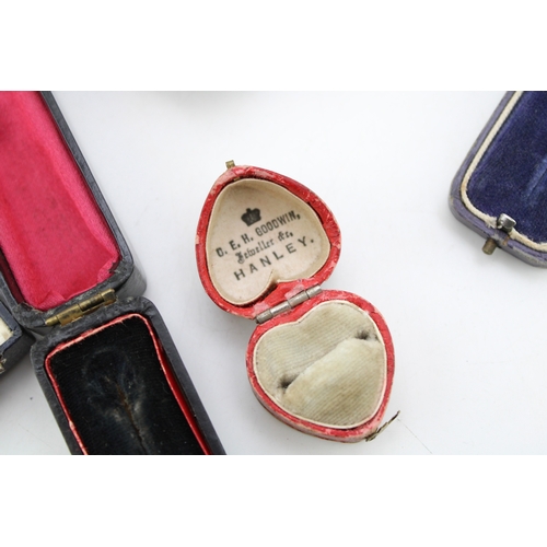 331 - A collection of antique push button and similar jewellery boxes, of note red antique heart shaped ri... 