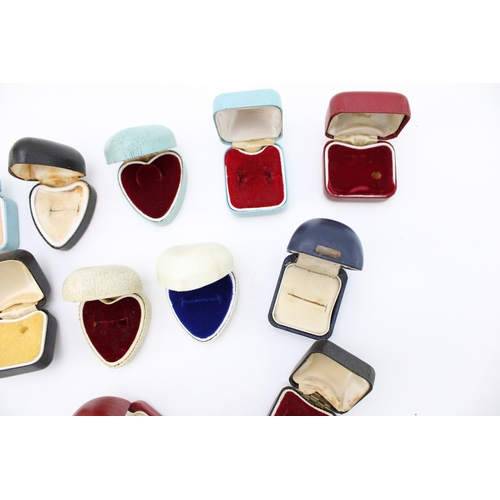 334 - A collection of vintage jewellery ring boxes, to include a number of heart shaped ring boxes and oth... 