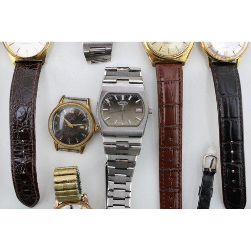 34 - A large collection of vintage and later wristwatches including thirteen manual or automatic watches ... 