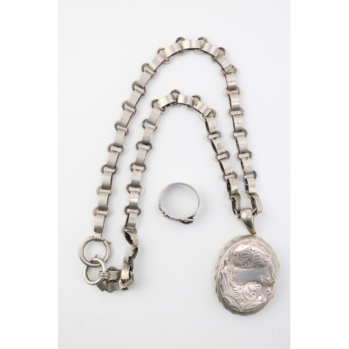 343 - A white metal locket and chain (tests as silver), vacant cartouche, with a silver buckle ring (2), 2... 