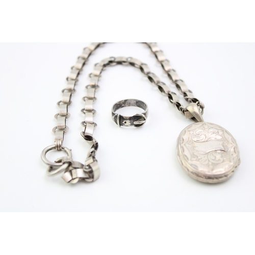 343 - A white metal locket and chain (tests as silver), vacant cartouche, with a silver buckle ring (2), 2... 