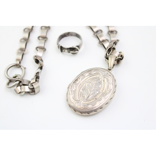 343 - A white metal locket and chain (tests as silver), vacant cartouche, with a silver buckle ring (2), 2... 