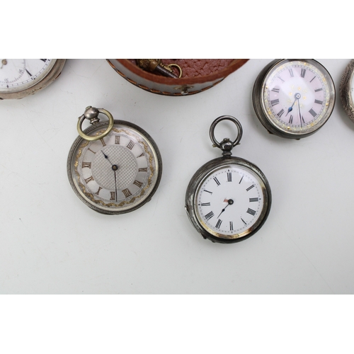 35 - A group of silver cased open faced pocket watches, comprising four English silver cased pocket watch... 