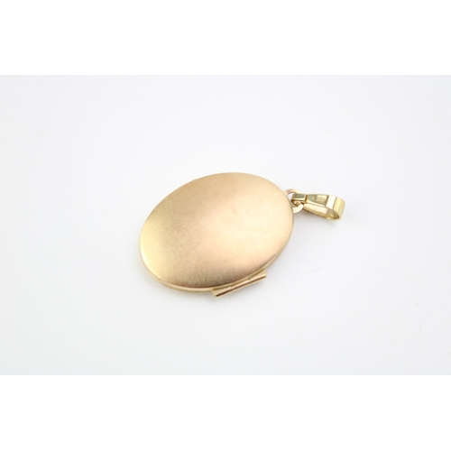 355 - 9ct hallmarked gold locket, 21mm diameter, 4.6g.