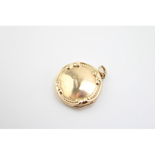 356 - 9ct hallmarked gold locket, 41mm high, 4.8g.