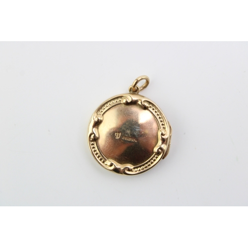 356 - 9ct hallmarked gold locket, 41mm high, 4.8g.