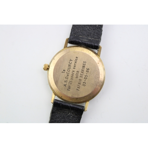 37 - A vintage Omega gentleman's wristwatch the signed champagne dial with baton numerals, minute track a... 