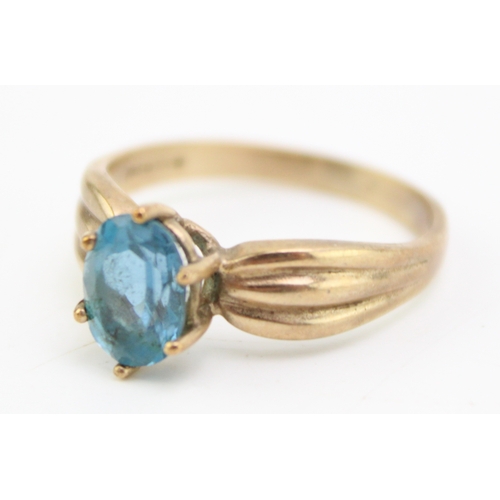 397 - 9ct gold blue topaz stone ring size P, 2.7g