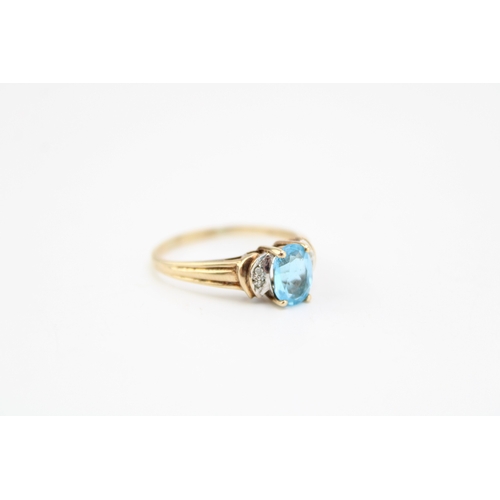 400 - 9ct gold aquamarine / blue topaz and white stone ring size T, 2.7g