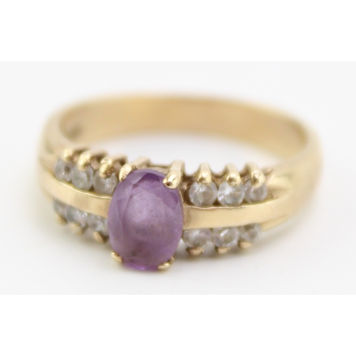 406 - 9ct gold purple and white stone ring size P / Q, 3.9g