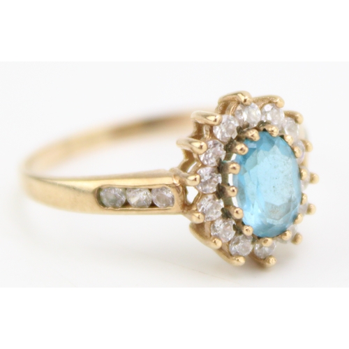 412 - 9ct gold blue topaz & white stone set ring size R, 2.6g