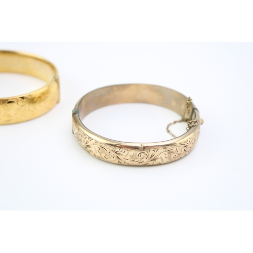 421 - Two x 9ct gold plated bangles, one stamped 1/5th 9ct, the other 9ct metal core, 48.9g