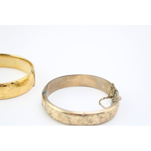 421 - Two x 9ct gold plated bangles, one stamped 1/5th 9ct, the other 9ct metal core, 48.9g