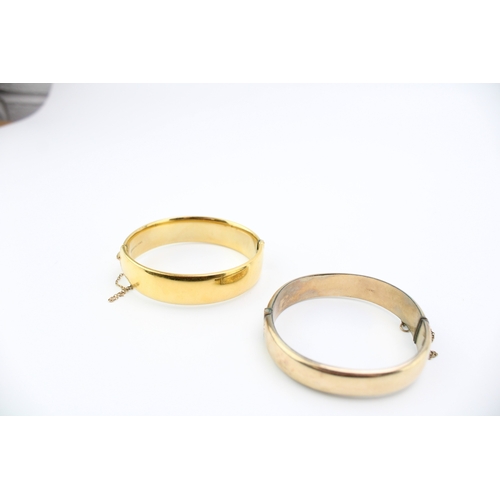 421 - Two x 9ct gold plated bangles, one stamped 1/5th 9ct, the other 9ct metal core, 48.9g