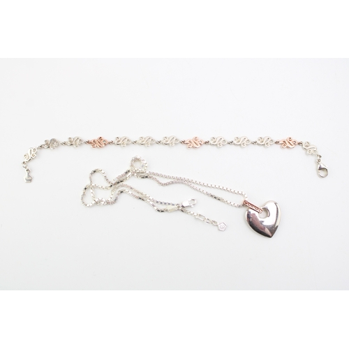 433 - A Clogau silver and diamond set bracelet, of thirteen open work swirl panels, three of which plated ... 