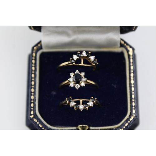 442 - A Brooks and Bentley Sapphire Splendour Triple Ring, comprising a central dress ring set with oval s... 