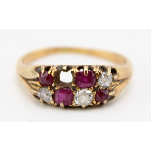 446 - A 12ct gold, ruby and diamond ring, the old cut stones, arranged in two rows of alternating colours,... 