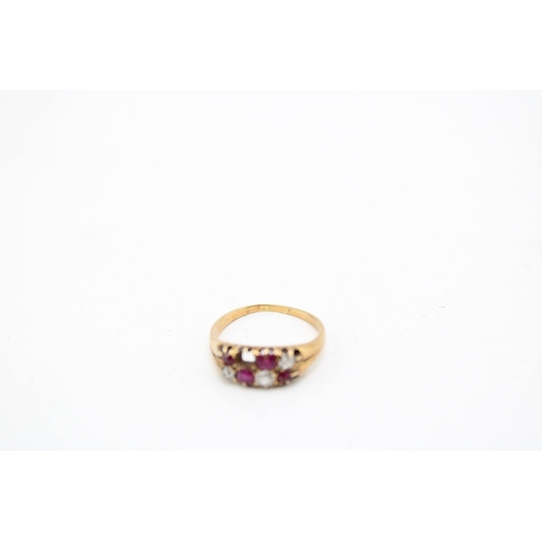 446 - A 12ct gold, ruby and diamond ring, the old cut stones, arranged in two rows of alternating colours,... 