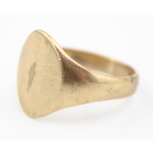 454 - A 9ct gold signet ring, the oval face blank, fully hallmarked inside shank, size O, 3.6g.