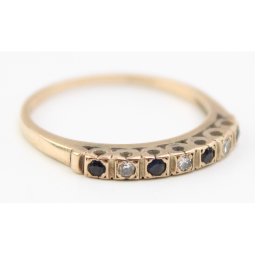 462 - A 9ct gold diamond and sapphire seven stone ring, set with four sapphires and three diamonds, fully ... 