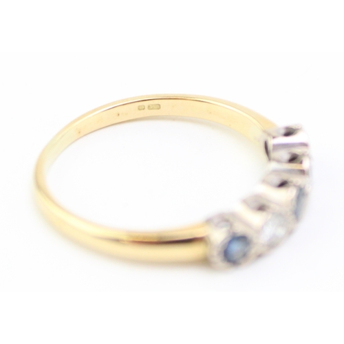 495 - An 18ct gold, diamond and sapphire five stone ring, set with two diamonds and three dusty cornflower... 