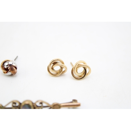 499 - A pair of 9ct gold knot earrings, 1.1g, a pair of tricolour knot earrings, unmarked 3.0g and an unma... 