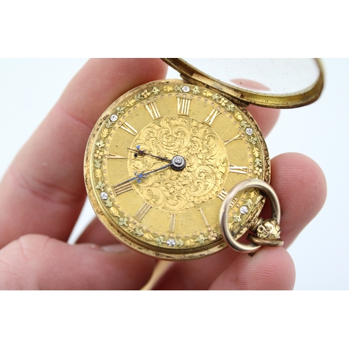 5 - An 18ct gold cased, open faced pocket watch, the engraved dial with Roman numerals to the chapter ri... 