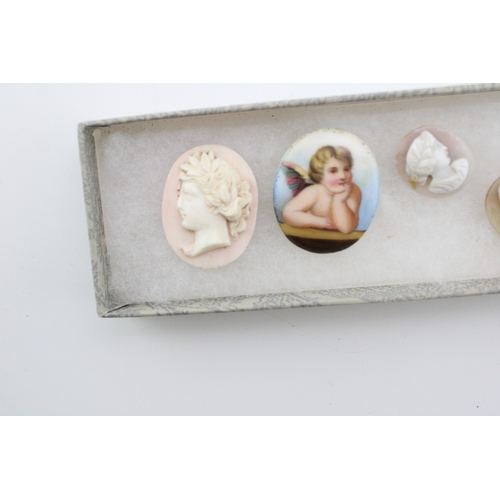 501 - A group of five cameos, all in the classical style, including two mounted as buttons, one larger lik... 