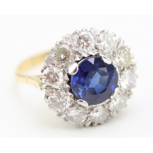 502 - An Art Deco 18ct gold, platinum, sapphire and diamond dress ring, the central deep royal blue sapphi... 