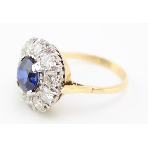 502 - An Art Deco 18ct gold, platinum, sapphire and diamond dress ring, the central deep royal blue sapphi... 