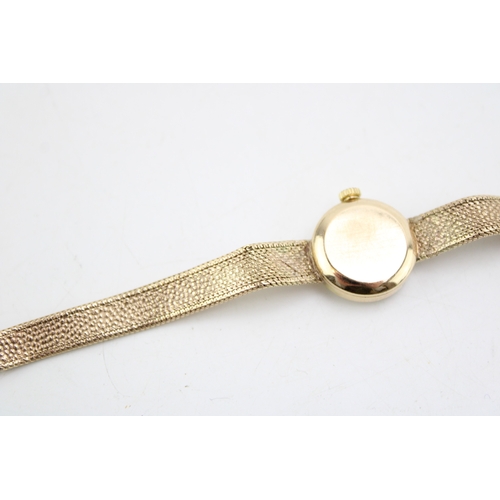 514 - 9ct gold cased lady's Tissot wristwatch, on 9ct gold bracelet, 14.3g.