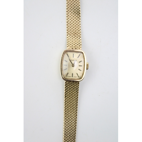 54 - Tissot 9ct gold lady's wristwatch, on 9ct gold bracelet, gross 20.6g.