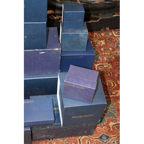 606 - A collection of empty Moorcroft pottery cardboard boxes, the largest being 58cm x 23cm x 23cm and sm... 