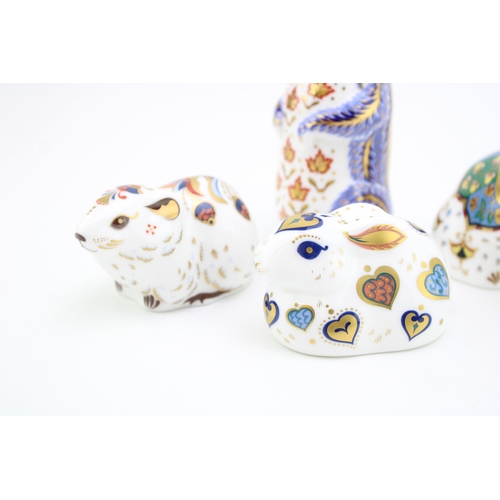 618 - Royal Crown Derby paperweight, Chipmunk; together with a Hamster, 6cm high, 'For You' Rabbit, decora... 