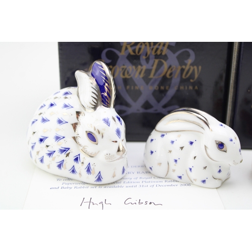 632 - A pair of Royal Crown Derby Paperweight, Platinum Rabbit and Baby Platinum Rabbit, to celebrate the ... 