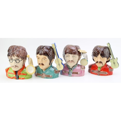 A collection of Peggy Davies The Beatles Pop Legend character jugs, all limited edition of 200 (4).