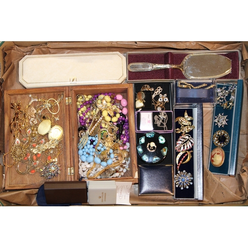 65 - A collection of costume jewellery to include vintage brooches, necklaces, gold plated items, watches... 