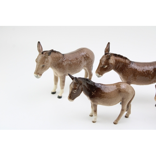 664 - Beswick Donkeys to include 2 larger examples and 2 smaller donkeys (4).