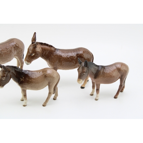 664 - Beswick Donkeys to include 2 larger examples and 2 smaller donkeys (4).