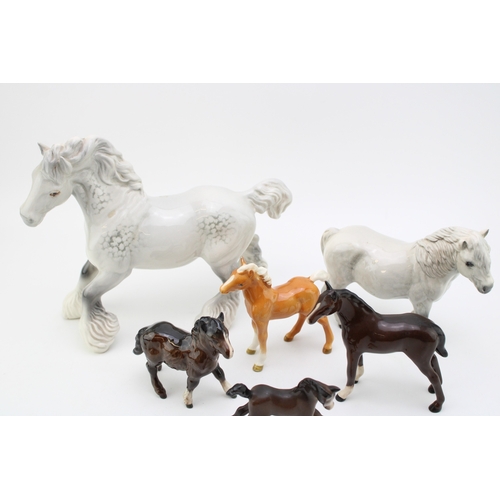 665 - Beswick to include a grey cantering shire, a grey pony with foals (6).