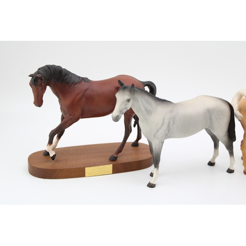 669 - Three Beswick horses, in matte, in grey, palamino and brown 'Spirit of Youth' (3).