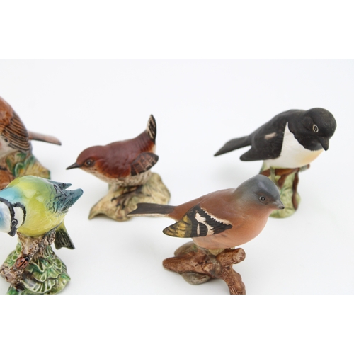 688 - Beswick birds to include a Greenfinch, a Bluetit, a Stonechat and others (6).