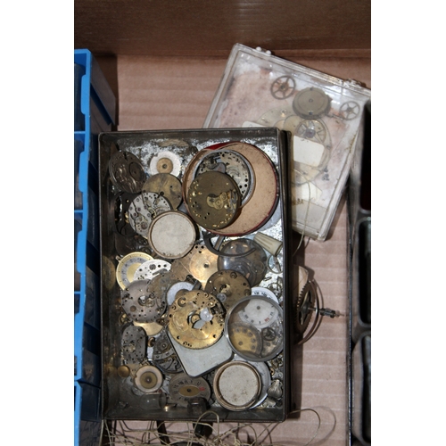 73 - A collection of pocket watch and wristwatch parts to include dials, movements, cases, springs and si... 